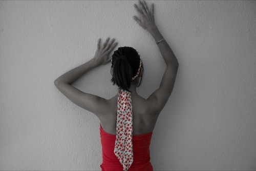 Selective girl near wall